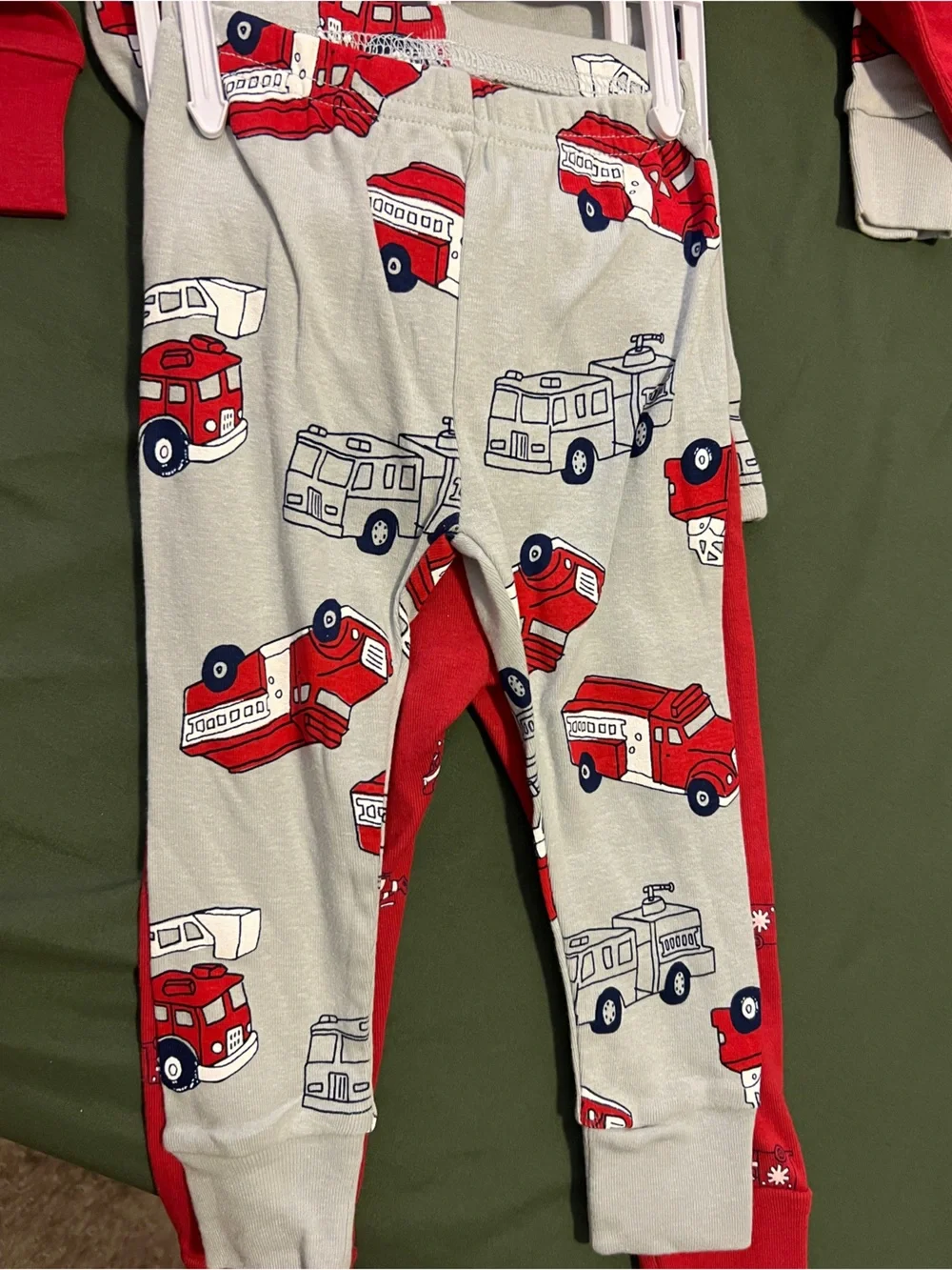 Two Pairs of Carter's Red and Gray Fire Truck Pajama Sets Size 12M.